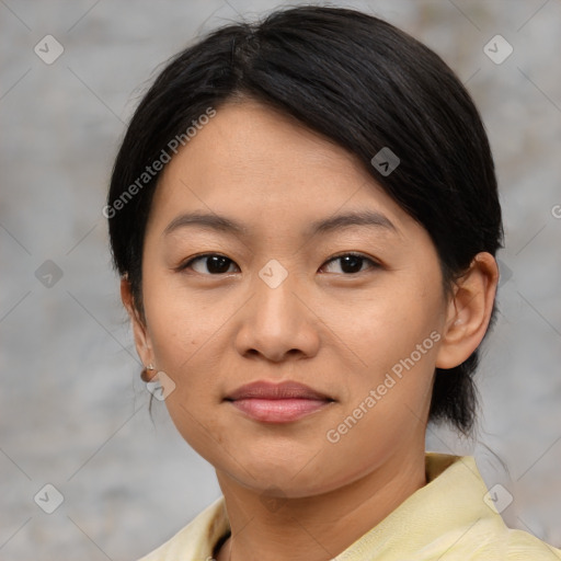 Joyful asian young-adult female with medium  brown hair and brown eyes