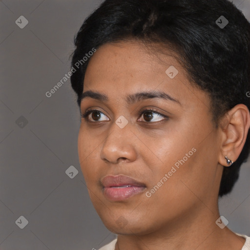 Neutral black young-adult female with short  black hair and brown eyes