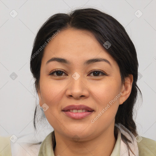 Joyful asian young-adult female with medium  brown hair and brown eyes