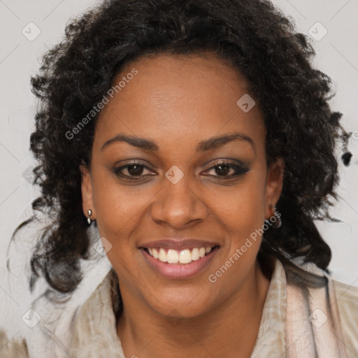 Joyful black young-adult female with long  brown hair and brown eyes