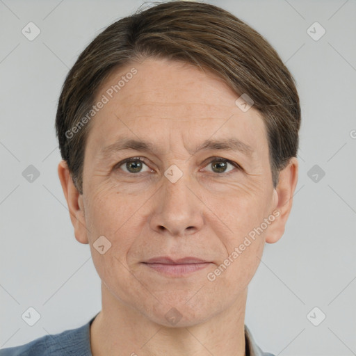 Joyful white adult male with short  brown hair and grey eyes