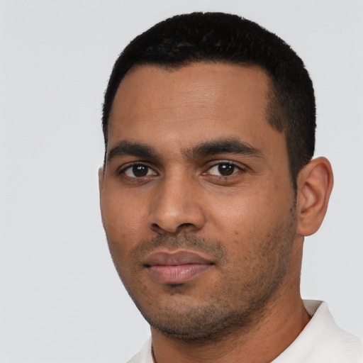 Neutral latino young-adult male with short  black hair and brown eyes