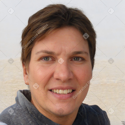 Joyful white young-adult female with short  brown hair and grey eyes