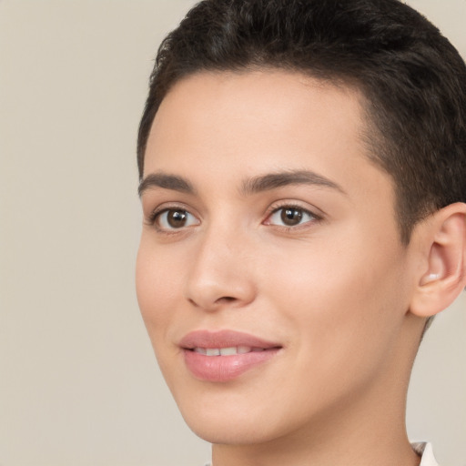 Joyful white young-adult female with short  brown hair and brown eyes