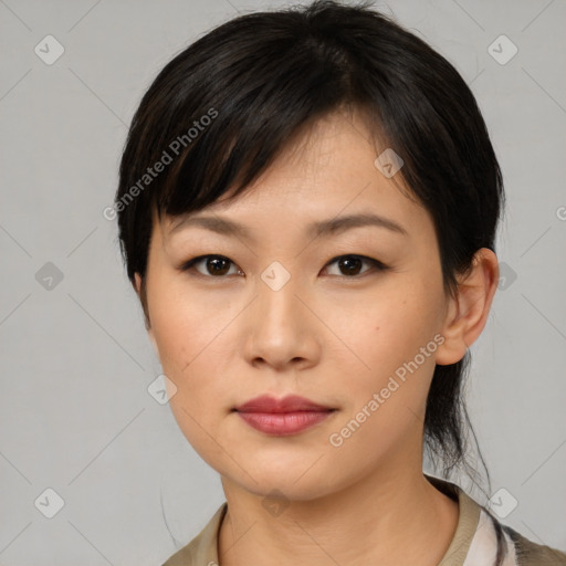 Neutral asian young-adult female with medium  black hair and brown eyes