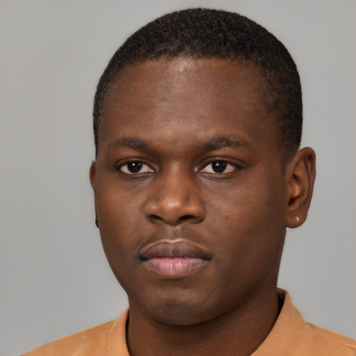 Neutral black young-adult male with short  brown hair and brown eyes