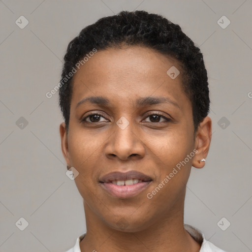 Joyful black young-adult female with short  black hair and brown eyes