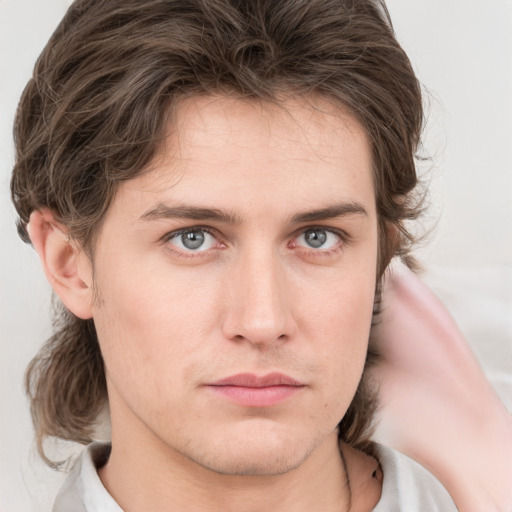 Neutral white young-adult male with medium  brown hair and grey eyes