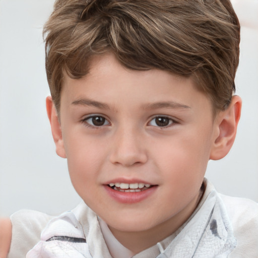 Joyful white child male with short  brown hair and brown eyes