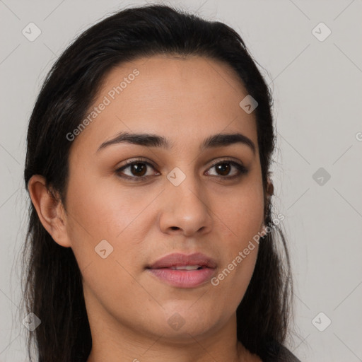 Joyful latino young-adult female with long  brown hair and brown eyes