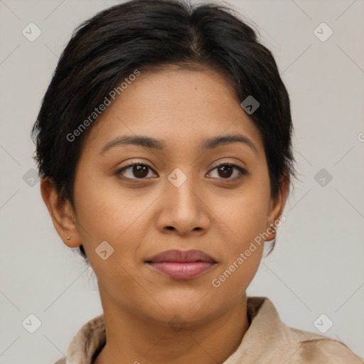 Joyful latino young-adult female with short  brown hair and brown eyes