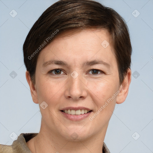 Joyful white young-adult female with short  brown hair and grey eyes