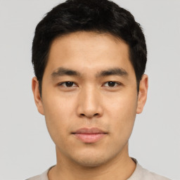 Neutral asian young-adult male with short  black hair and brown eyes