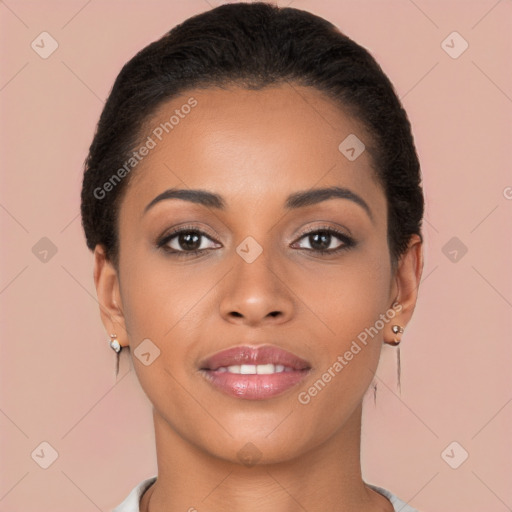 Joyful latino young-adult female with short  black hair and brown eyes