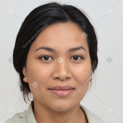 Joyful latino young-adult female with medium  brown hair and brown eyes