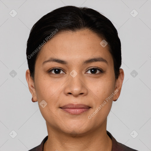 Joyful latino young-adult female with short  black hair and brown eyes