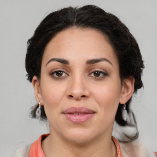 Joyful white young-adult female with medium  brown hair and brown eyes