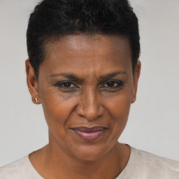 Joyful black adult female with short  brown hair and brown eyes