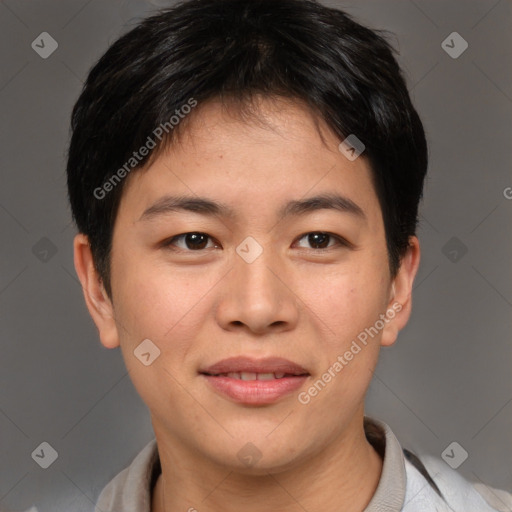 Joyful asian young-adult male with short  brown hair and brown eyes