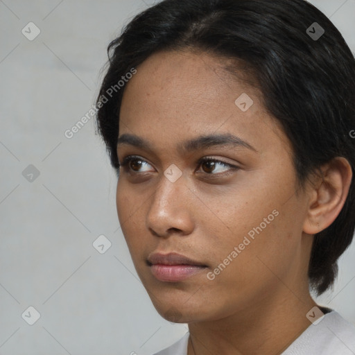 Neutral asian young-adult female with medium  brown hair and brown eyes