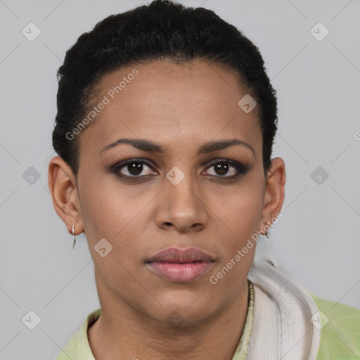 Joyful latino young-adult female with short  brown hair and brown eyes