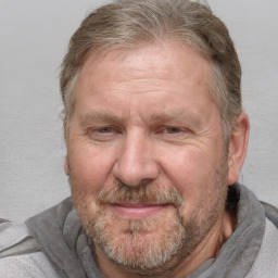 Joyful white middle-aged male with short  brown hair and brown eyes