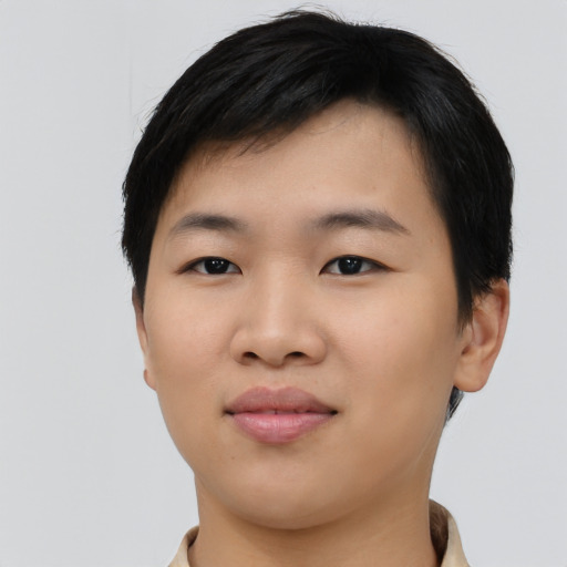 Joyful asian young-adult female with short  black hair and brown eyes