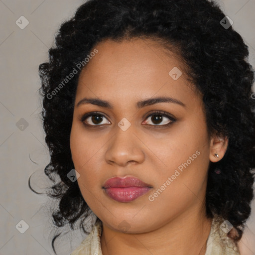 Joyful black young-adult female with medium  black hair and brown eyes