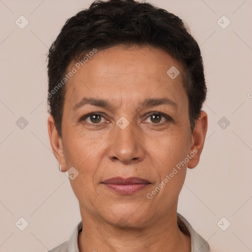 Joyful white adult female with short  brown hair and brown eyes