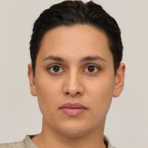 Neutral white young-adult female with short  brown hair and brown eyes