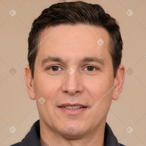 Joyful white adult male with short  brown hair and brown eyes