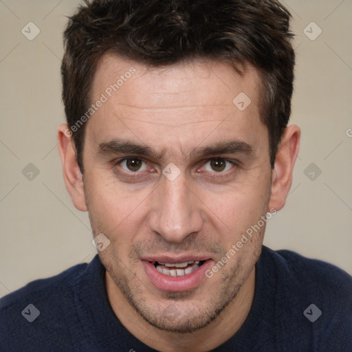 Joyful white adult male with short  brown hair and brown eyes