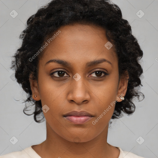 Neutral black young-adult female with medium  brown hair and brown eyes