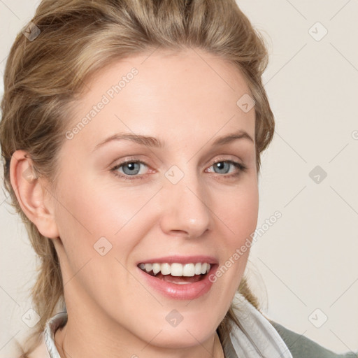 Joyful white young-adult female with medium  brown hair and blue eyes