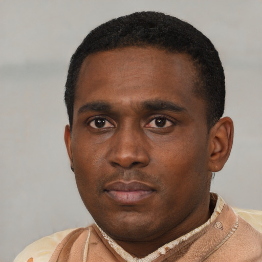 Neutral black young-adult male with short  black hair and brown eyes