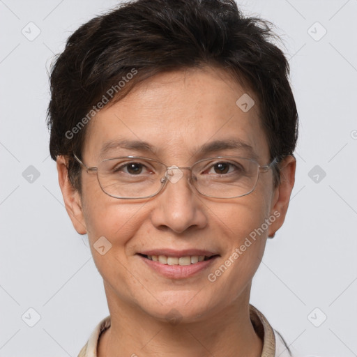 Joyful white adult female with short  brown hair and brown eyes