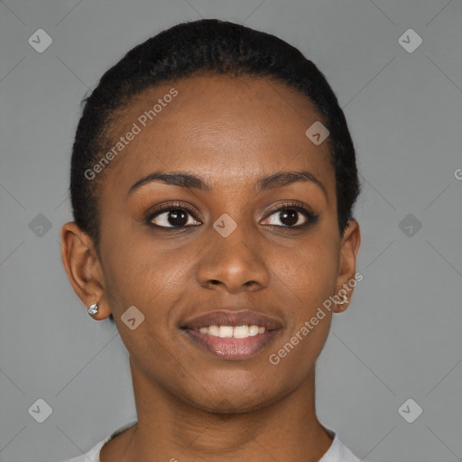 Joyful black young-adult female with short  brown hair and brown eyes