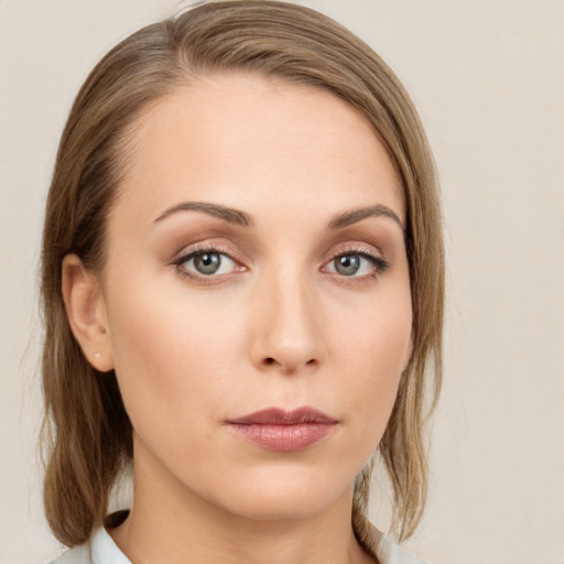 Neutral white young-adult female with medium  brown hair and blue eyes