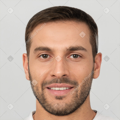 Joyful white young-adult male with short  brown hair and brown eyes