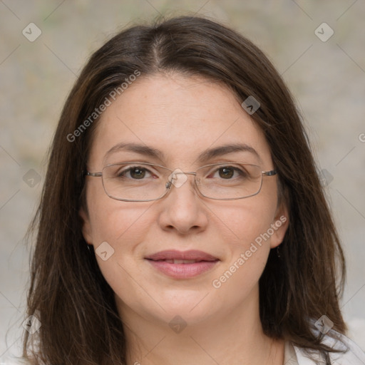 Joyful white adult female with medium  brown hair and grey eyes