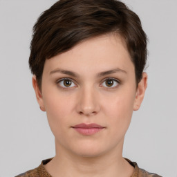 Neutral white young-adult female with short  brown hair and brown eyes