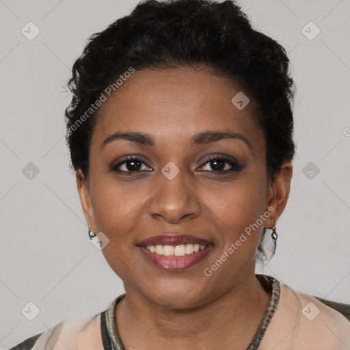 Joyful black young-adult female with short  brown hair and brown eyes