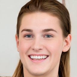 Joyful white young-adult female with long  brown hair and blue eyes