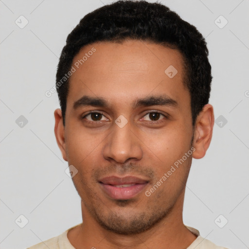 Neutral latino young-adult male with short  black hair and brown eyes