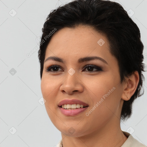 Joyful latino young-adult female with medium  black hair and brown eyes