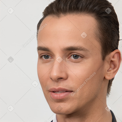 Neutral white young-adult male with short  brown hair and brown eyes