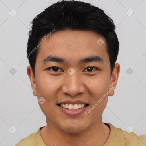 Joyful asian young-adult male with short  black hair and brown eyes