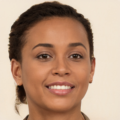 Joyful white young-adult female with long  brown hair and brown eyes