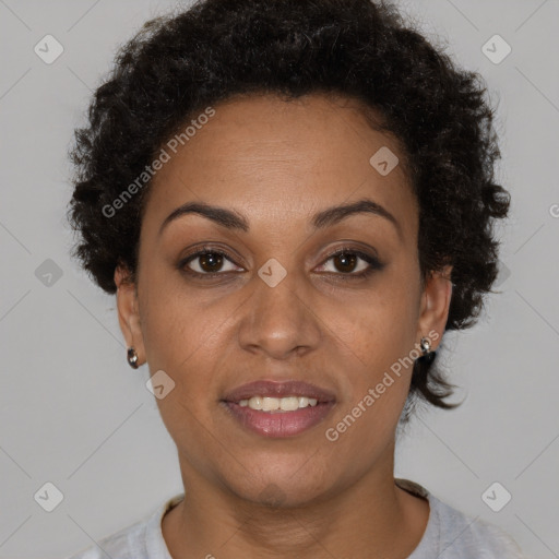 Joyful black adult female with short  brown hair and brown eyes