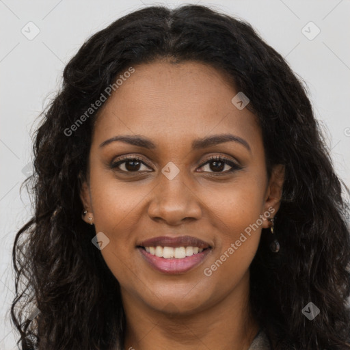 Joyful black young-adult female with long  brown hair and brown eyes